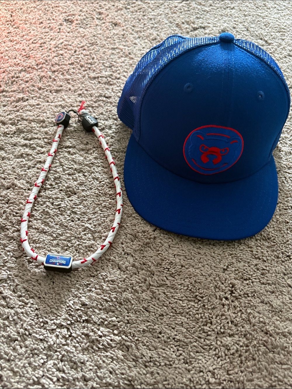 Chicago Cubs trucker hat with national champs gamewear necklace.  Fitted 7 1/8